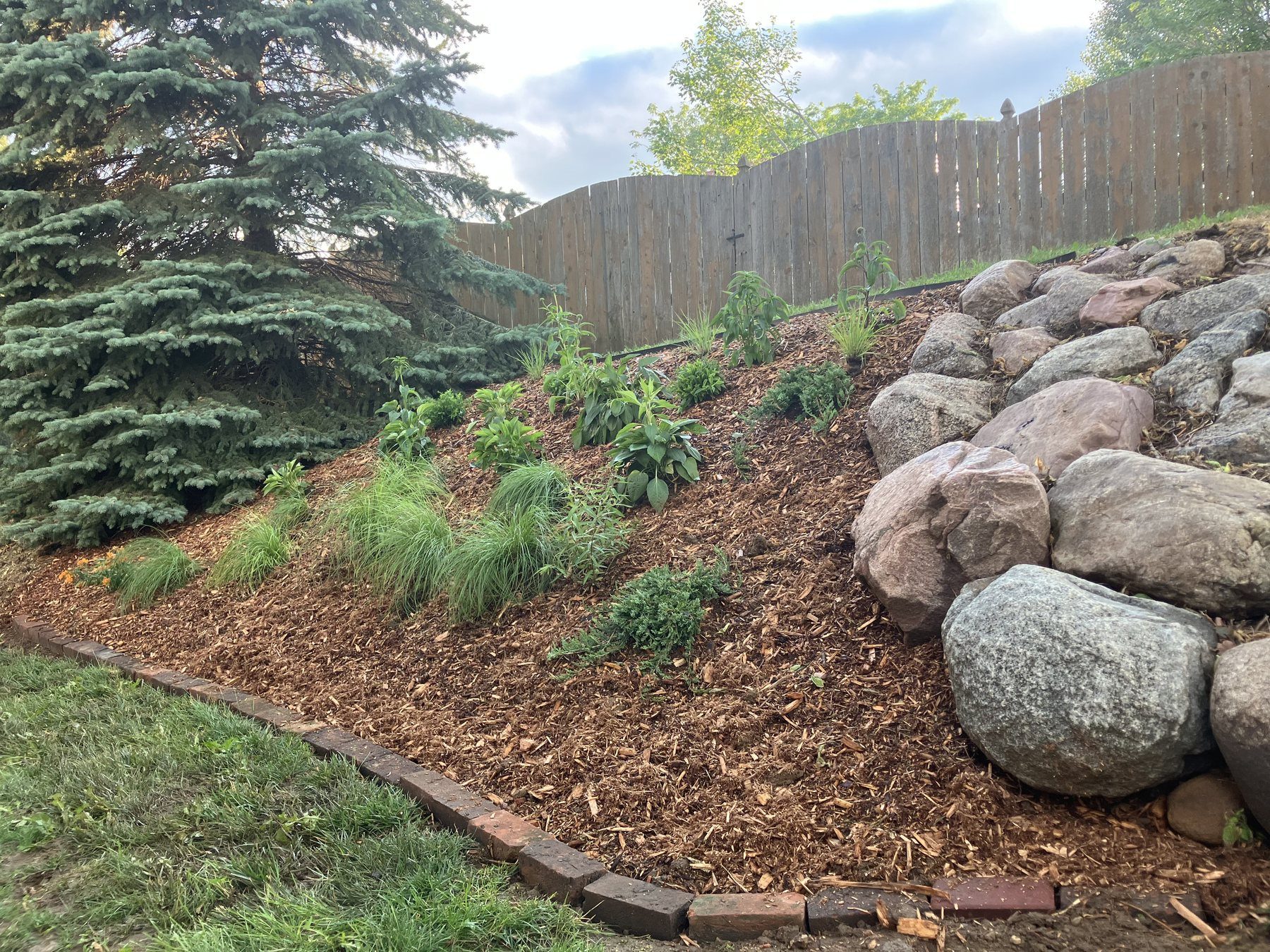 Landscape design and installation by The Tree Daddy in the Omaha area